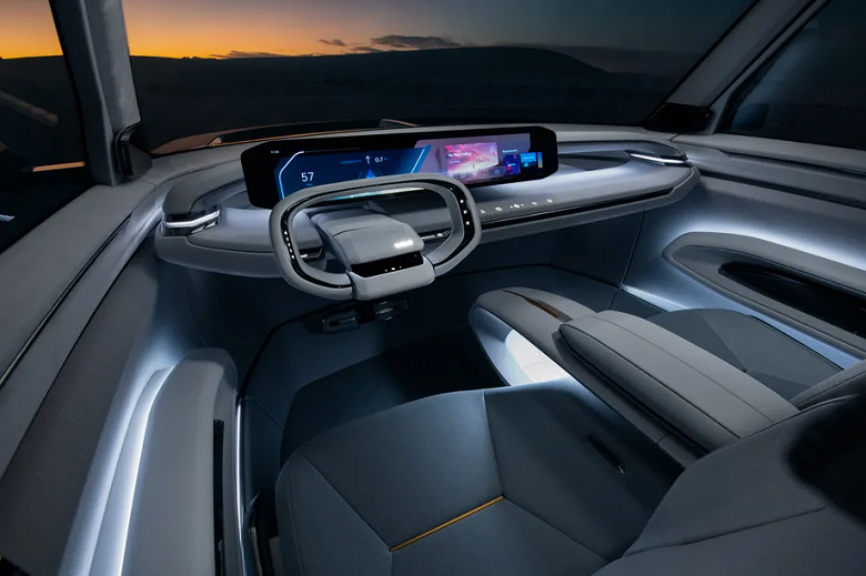 The power reserve is 480 km, a 27-inch screen, a display instead of a radiator grill and a transforming salon. The electric crossover Kia Concept EV9 presented